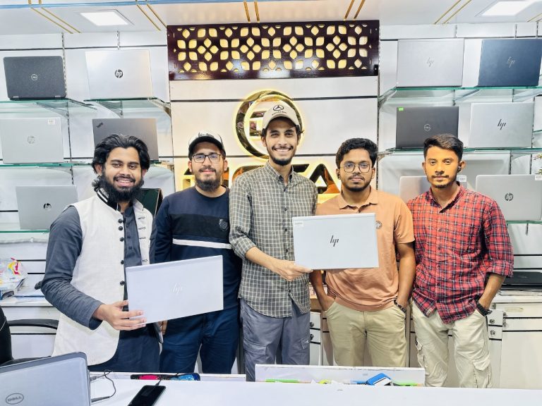 Happy customer with a laptop from Digital Computer Shop