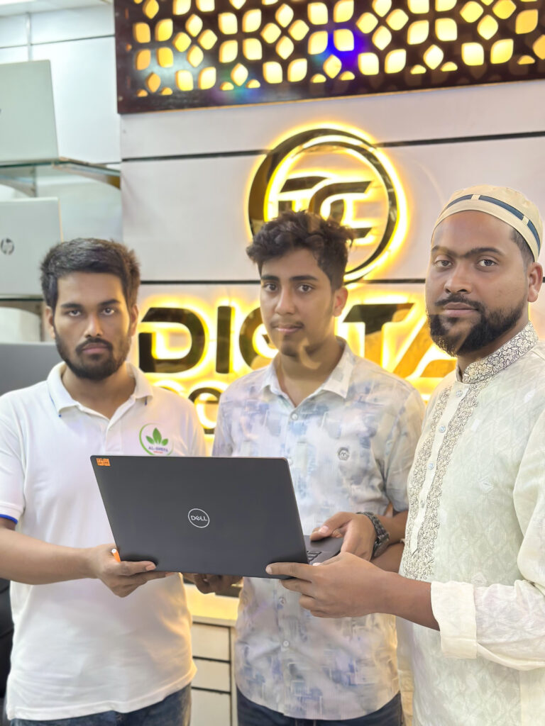 Happy customer with a laptop from Digital Computer Shop