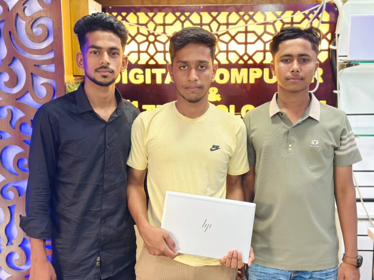Happy customer with a laptop from Digital Computer Shop