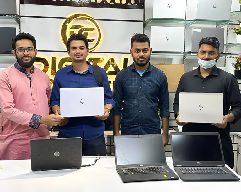 Happy customer with a laptop from Digital Computer Shop