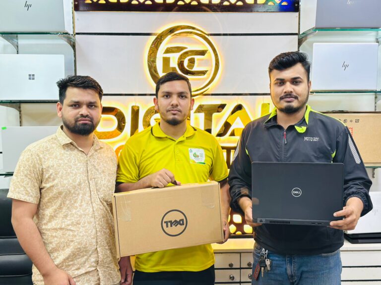 Happy customer with a laptop from Digital Computer Shop